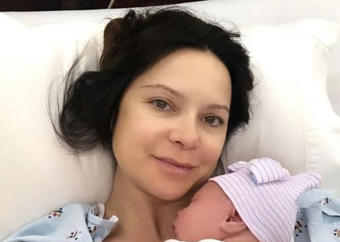 Лилия Подкопаева и новорожденная дочь