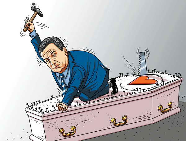 украинская политика в карикатурах Янукович заколачивает гроб БЮТ