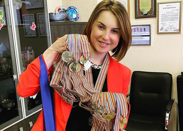 Ирина Слуцкая с медалями