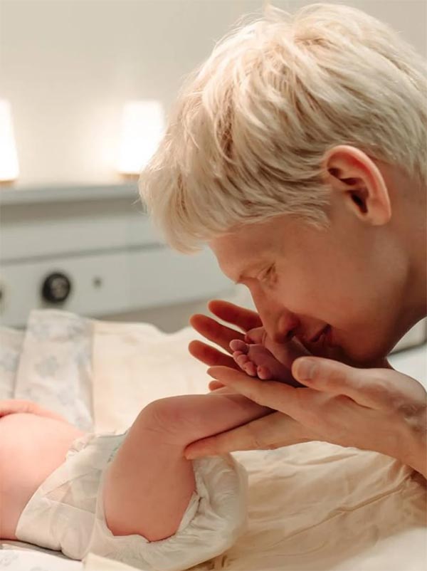 Святослав Рогожан и новорожденный сын Кай