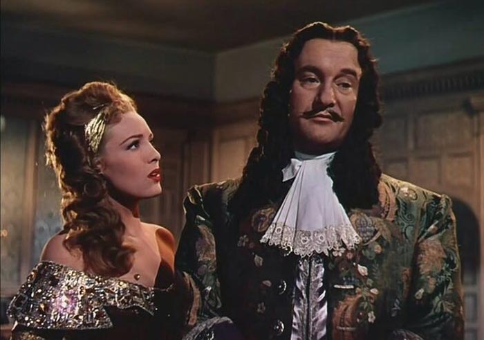 Джордж Сандерс в роли Карла II