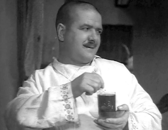 Степан Каюков в фильме Трактористы