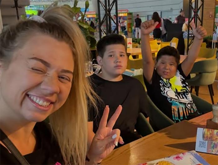 Ксения Радо с сыновьями