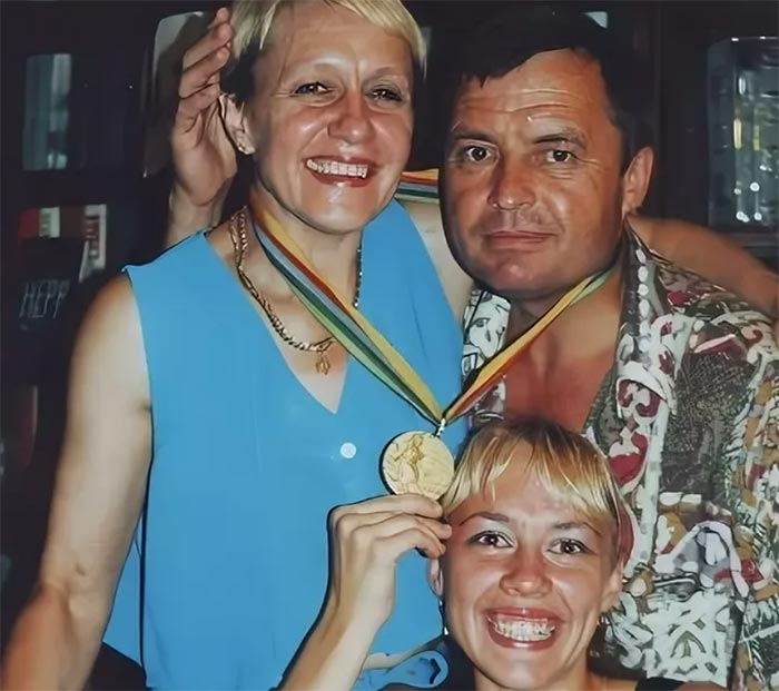 Надежда Олизаренко с мужем и дочерью