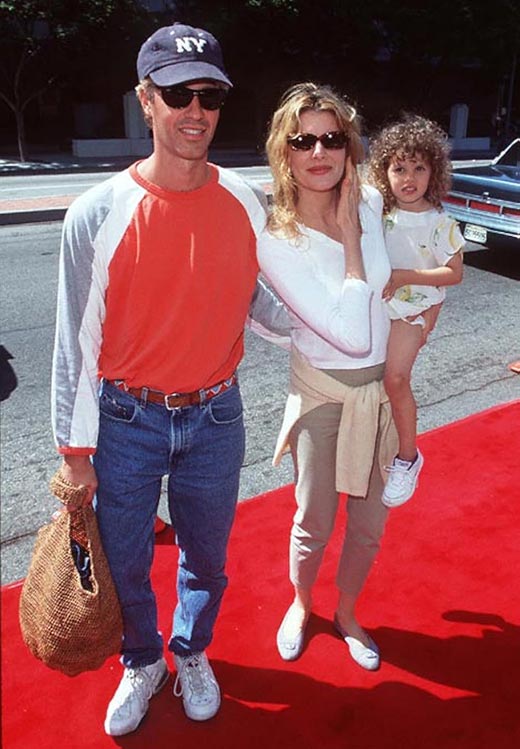 Рене Руссо и Дэн Гилрой с дочерью