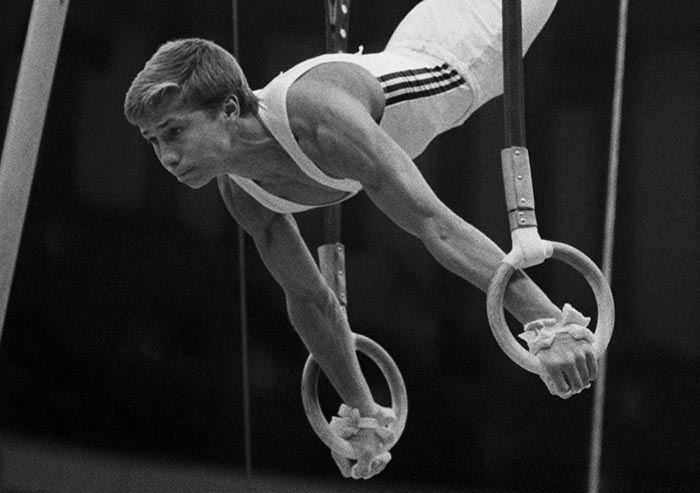гимнаст Валерий Люкин на кольцах