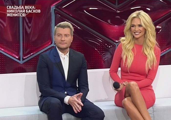 Виктория Лопырева в розовом платье и Николай Басков