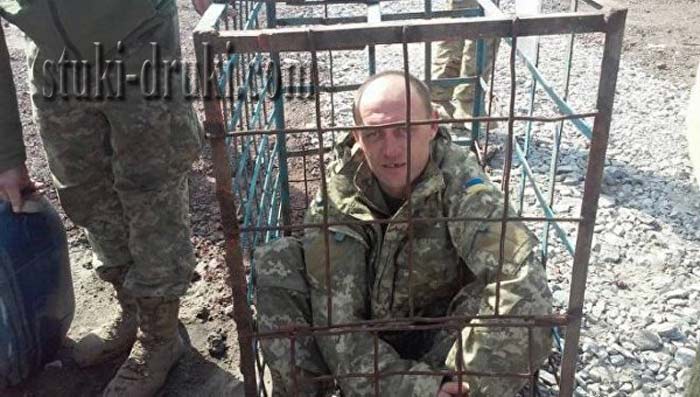 украинский солдат в клетке 2