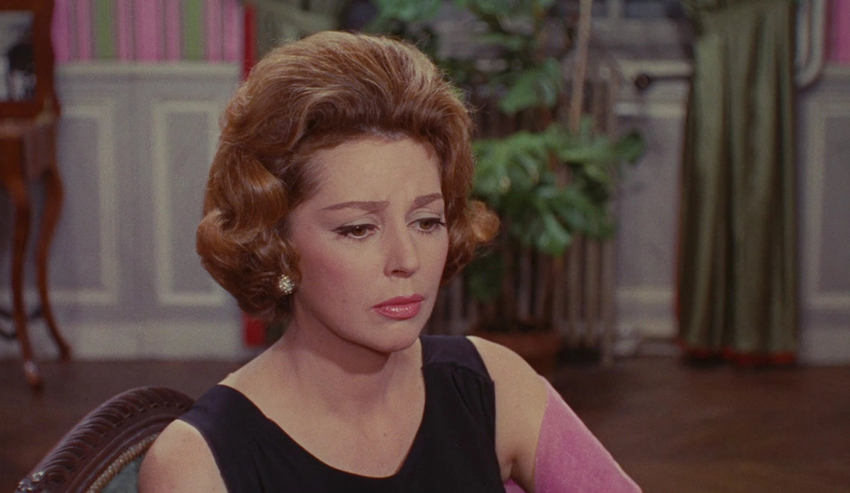 Анн Вернон в фильме Шербурские зонтики Анн Вернон в фильме Шербурские зонтики